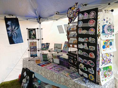 Marquette Pride 2026 picture of the Infinitas Publishing Booth Setup